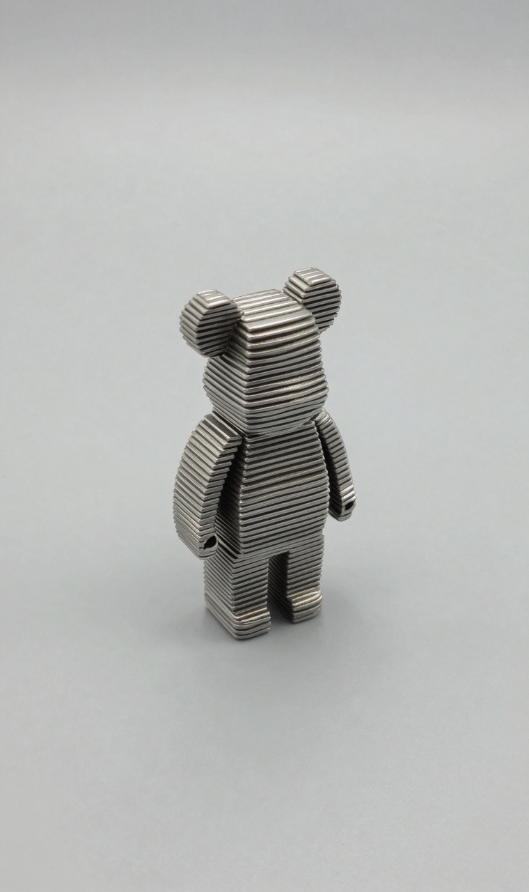 A small 3D standing fuse bead sculpture made of stacked layers