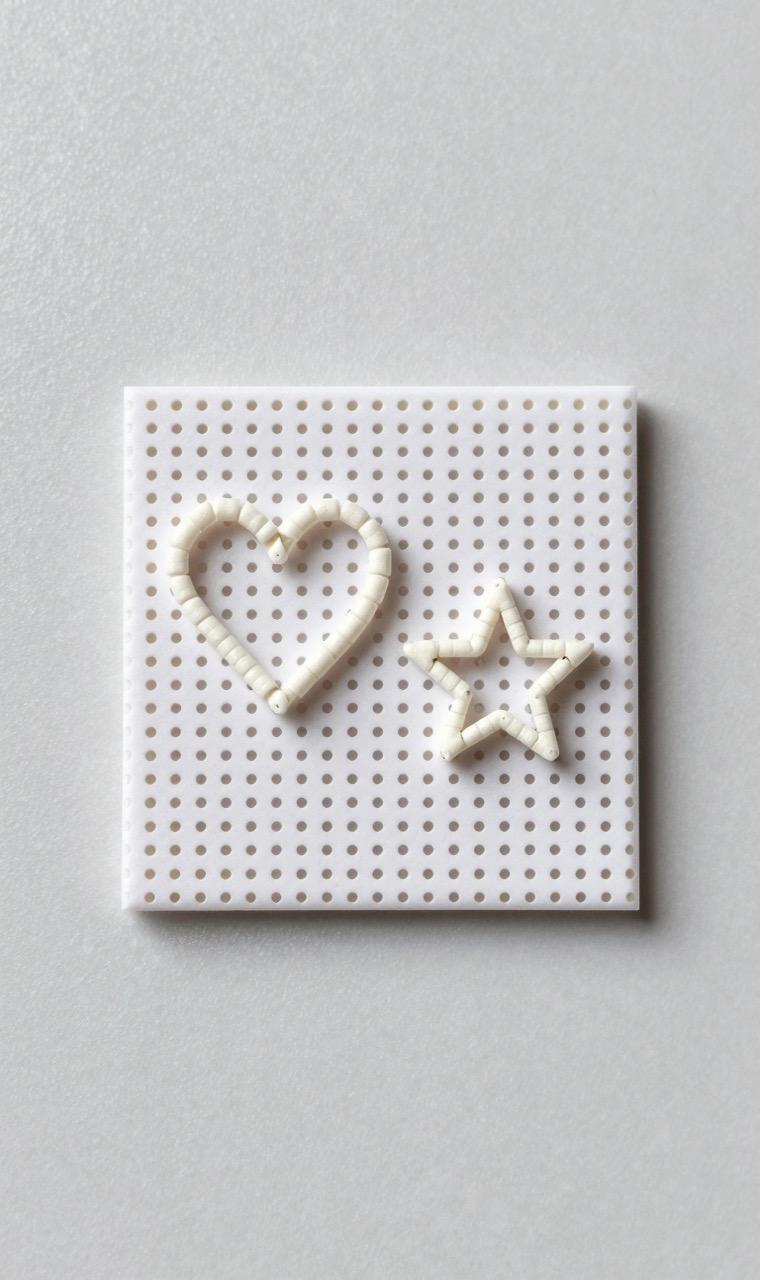Tiny earring-sized bead patterns on mini pegboards