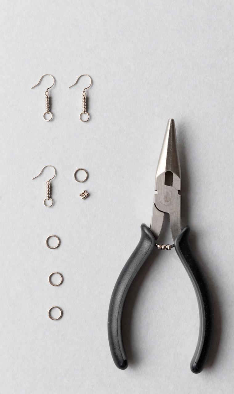 Earring hooks, jump rings, pliers, and mini bead pieces
