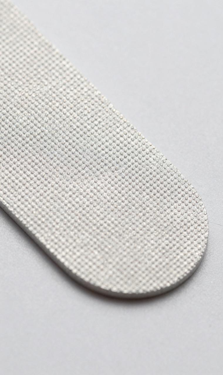 Macro of a bead surface with raised bumpy texture